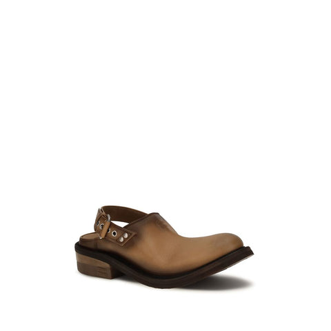 Mules Miu Miu en cuir de veau marron Bos Taurus